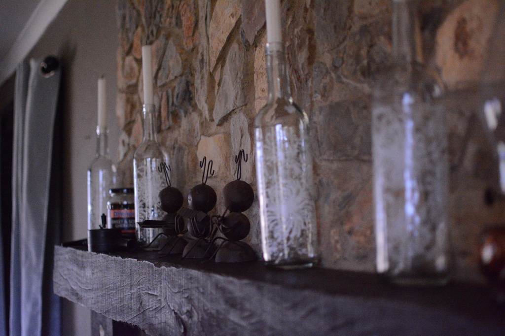 Decorated stone fireplace mantel