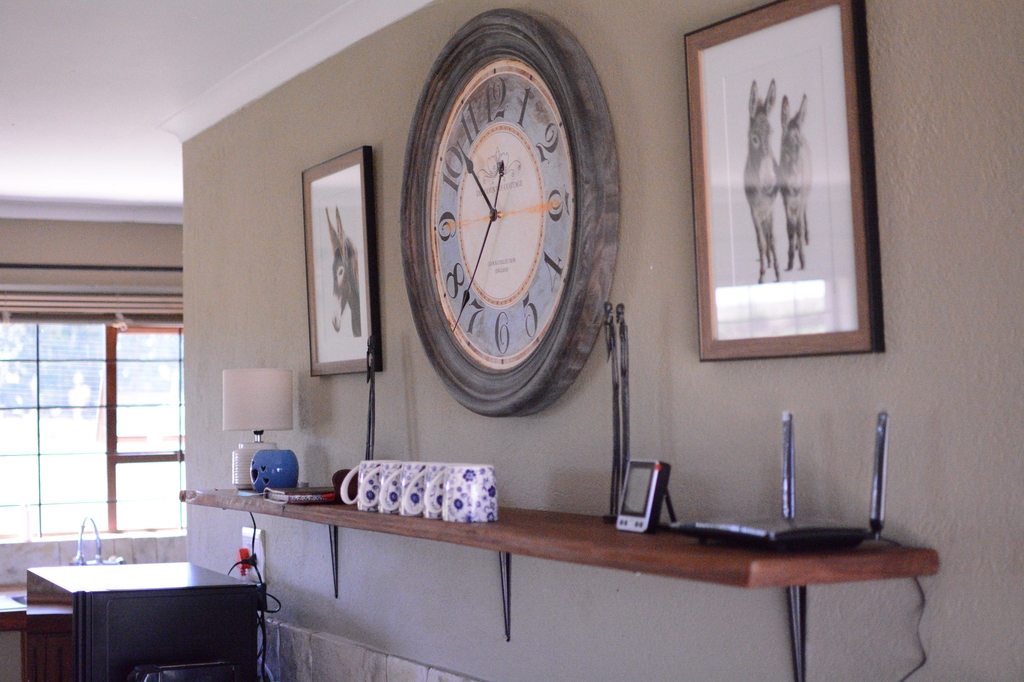 Kitchen wall clock and coffee shelf