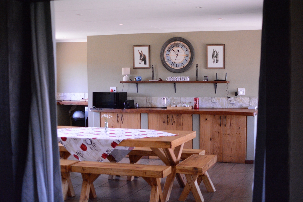 Kitchen and dining table seen from the doorway