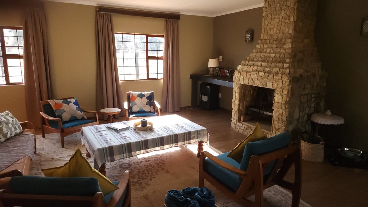 Lounge seating around the stone fireplace