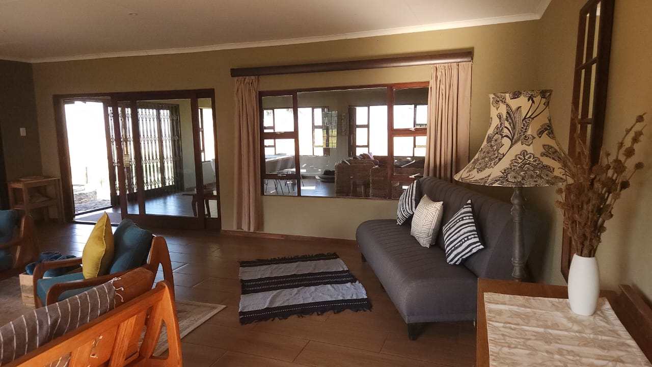 Living room with sofa and farm views