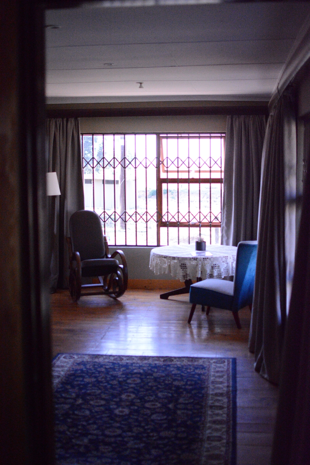 Bedroom sitting area seen from the doorway