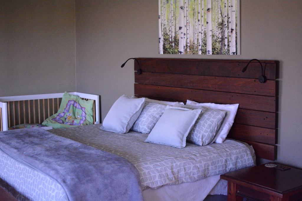 Main bedroom with ensuite and crib