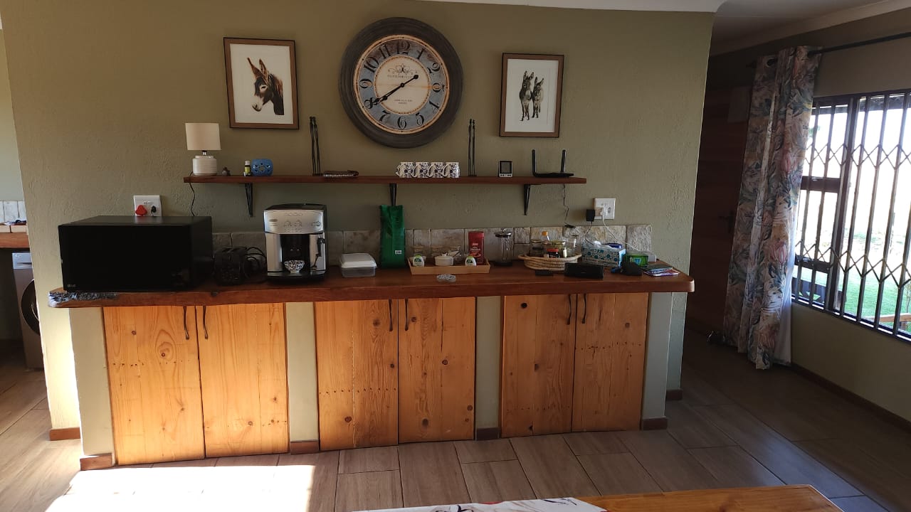 Kitchen coffee station and wooden cabinets