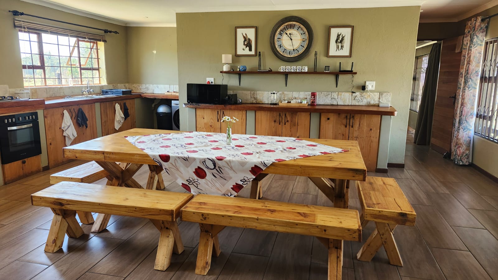 Kitchen and wooden dining table